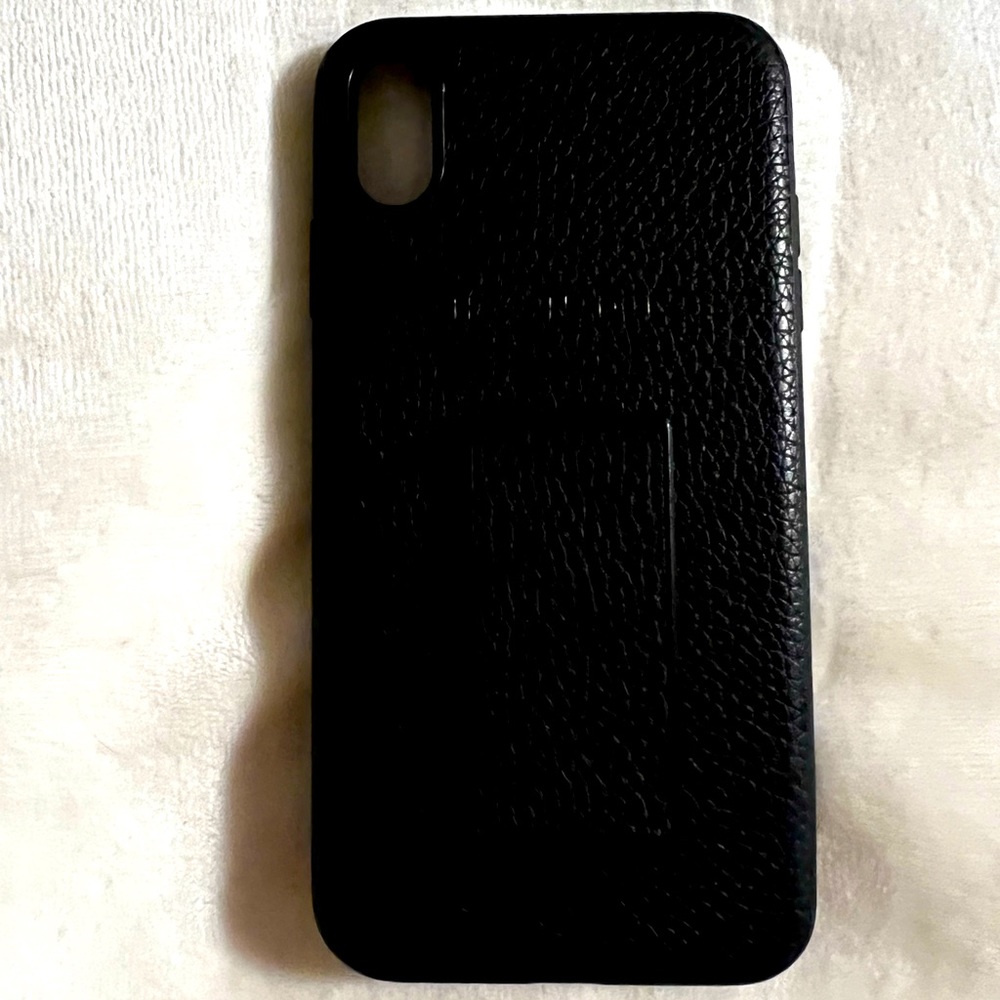 Leather style phone case with a built in pop socket/phone stand